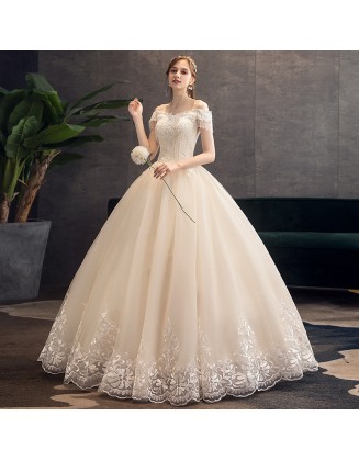 New trailing champagne color wedding dress